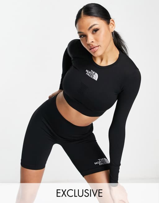 The North Face Training - Sømløs performance-top med lange ærmer i sort - Kun hos ASOS