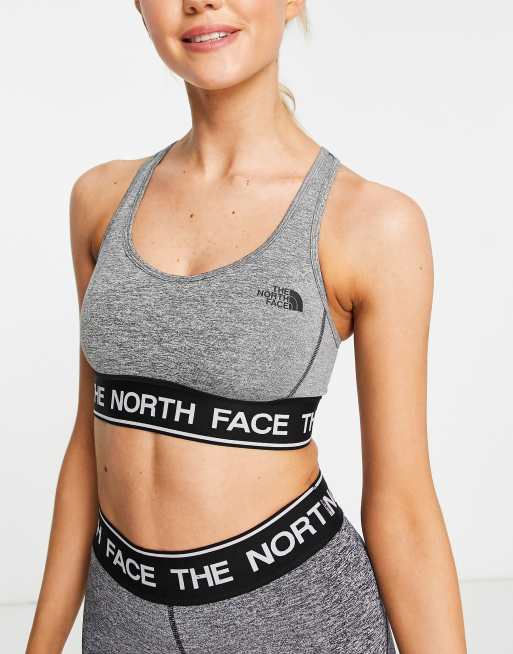 Nike Training Dri-FIT Icon Clash Swoosh medium-support padded keyhole ditsy  floral print sports bra in black