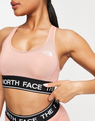 The North Face Training Tech medium support sports bra in pink