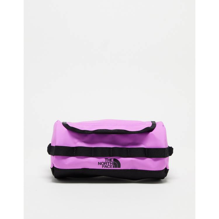 The North Face travel canister in purple ASOS