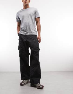 U NSE - Pantalon ceinturé - Noir tnf S