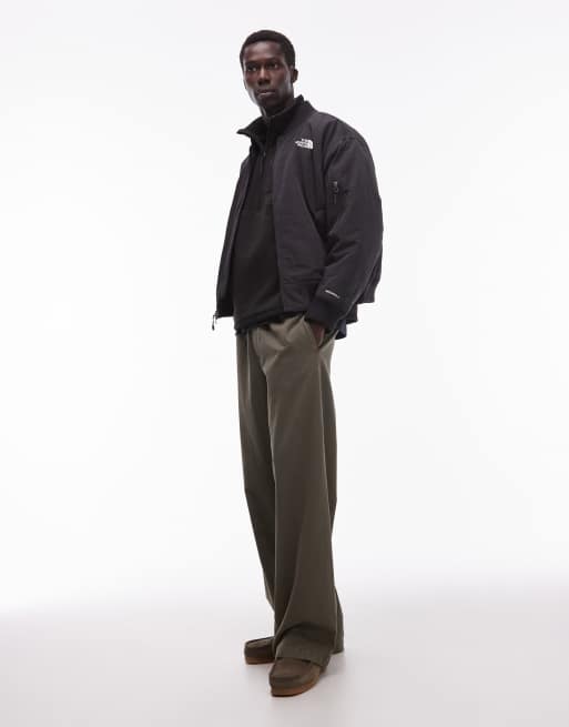 The North Face unisex insulated bomber jacket in black, 2 of 5