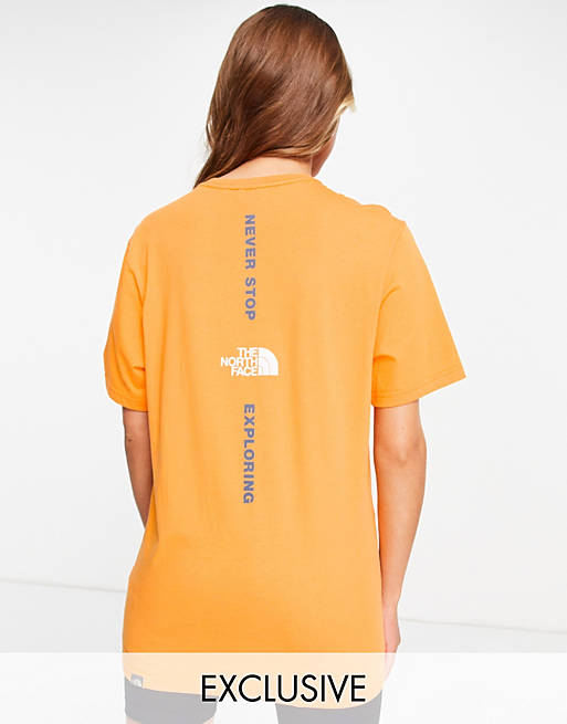  The North Face Vertical t-shirt in orange Exclusive at  
