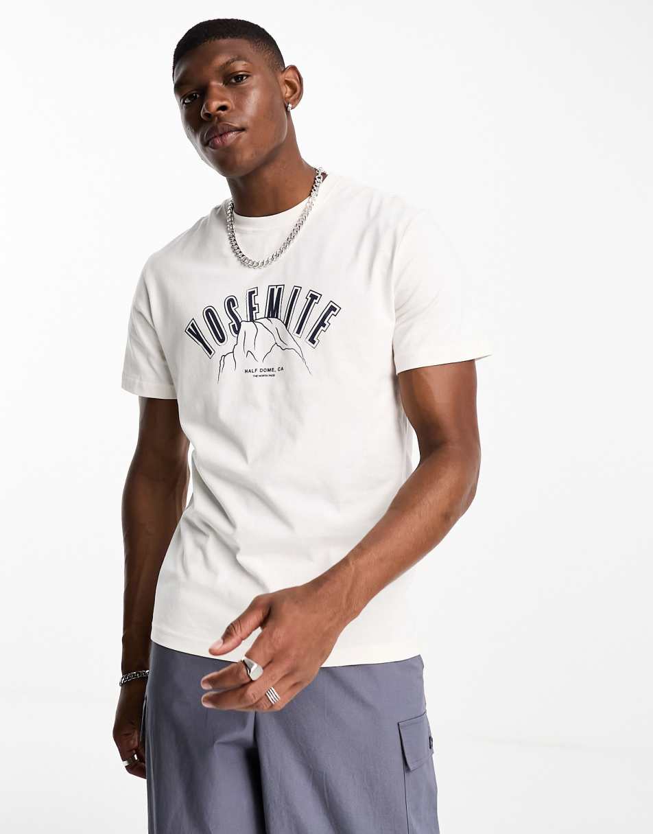 The North Face Vintage Yosemite chest print t-shirt in off white Exclusive at ASOS 1