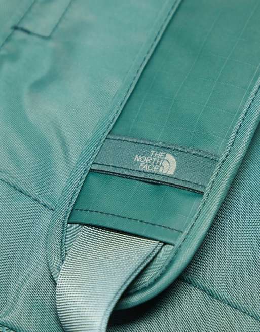 The North Face Voyager tote bag in green, 4 of 4