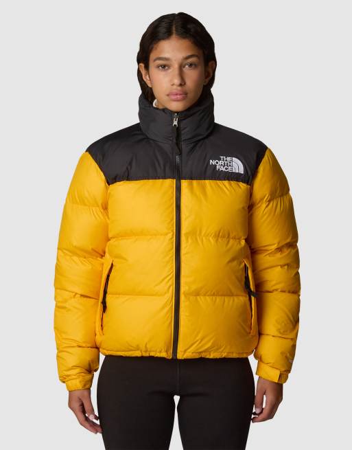 The North Face W 1996 Retro Nuptse Pufferjacke in Gelb und Schwarz