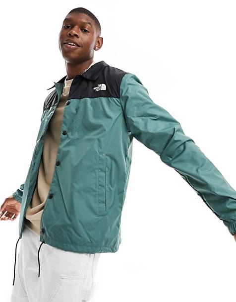 The North Face water-repellent coach jacket in green and black Exclusive at ASOS