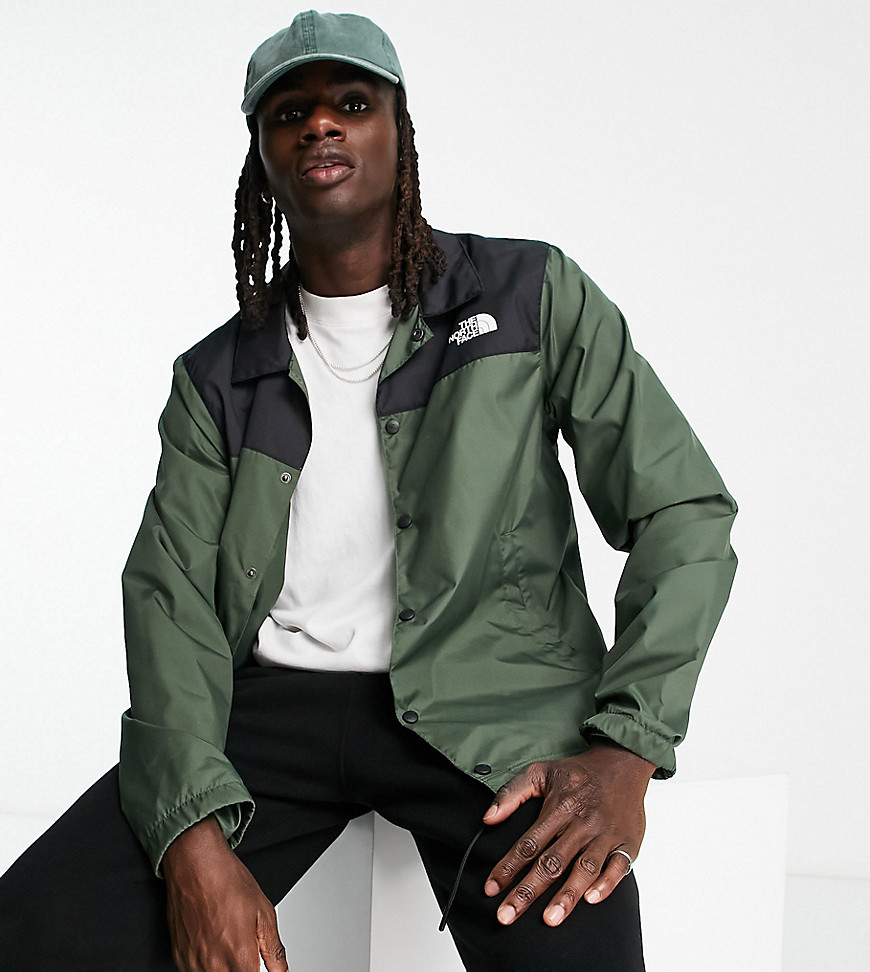 The North Face water repellent coach jacket in khaki and black - Exclusive at ASOS-Green