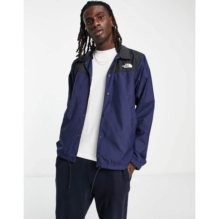 The North Face water repellent coach jacket in navy and black