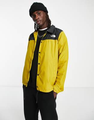 The North Face water repellent coach jacket in yellow and black - Exclusive at ASOS-Neutral