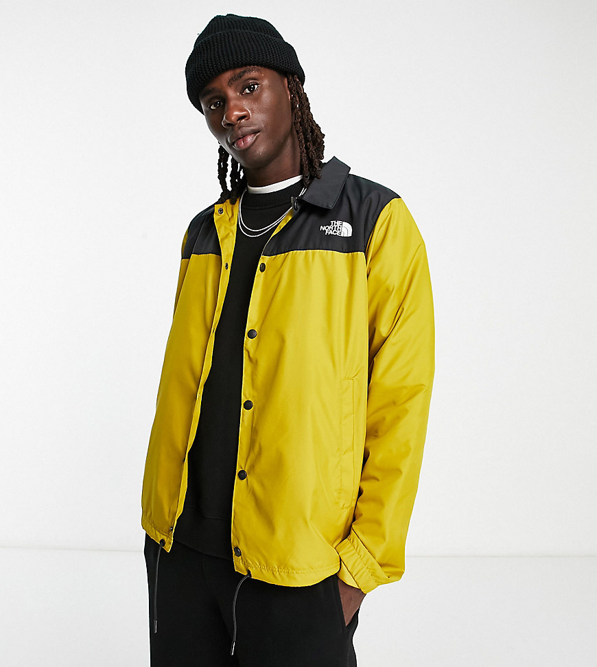 The North Face water repellent coach jacket in yellow and black - Exclusive at ASOS-Neutral