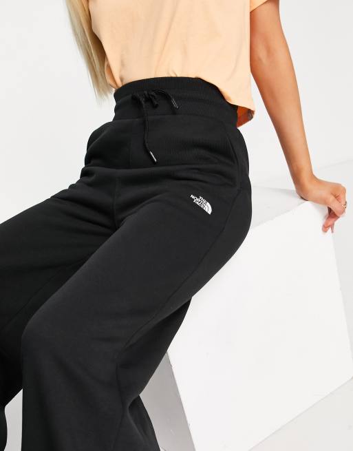 The North Face wide leg fleece joggers in black Exclusive at ASOS