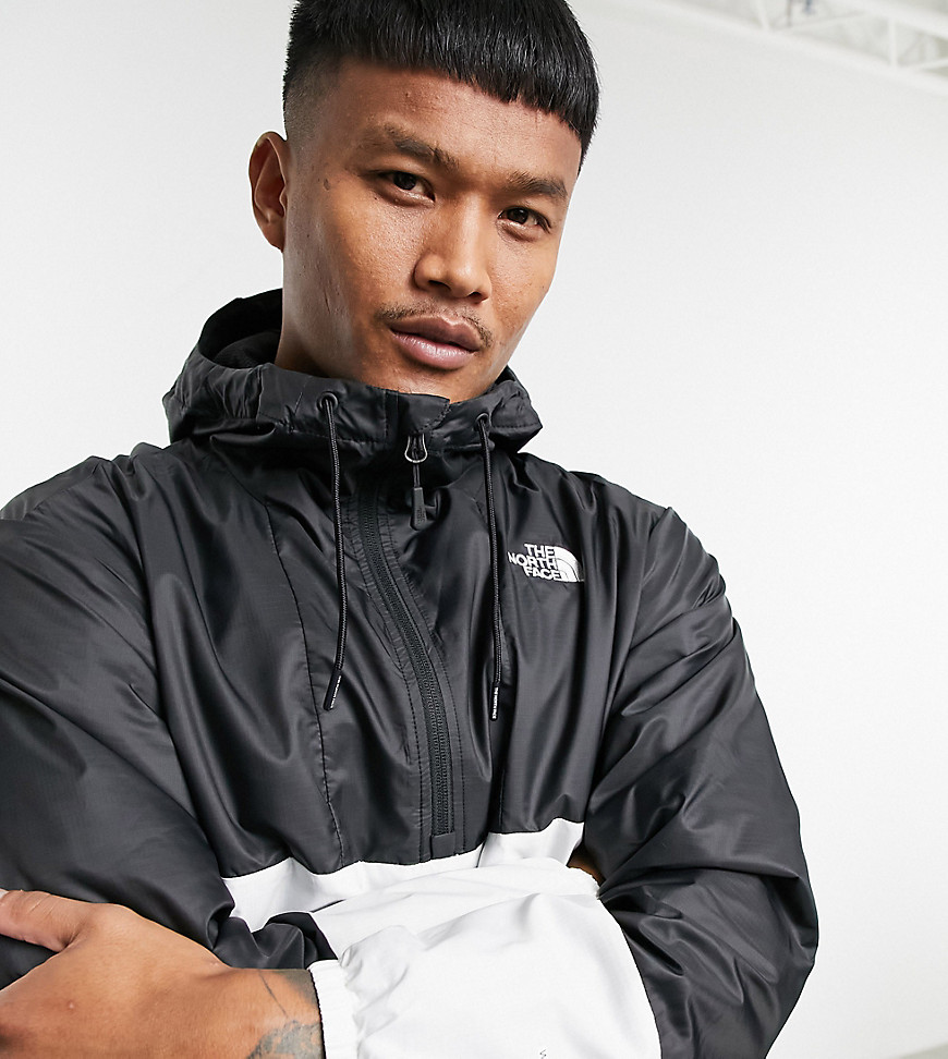 The North Face Wind anorak in white/black Exclusive to ASOS
