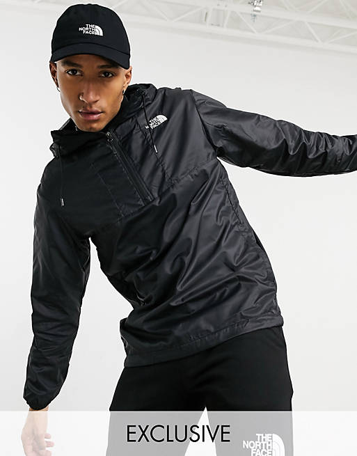 The North Face Wind Anorak jacket in black Exclusive at ASOS | ASOS
