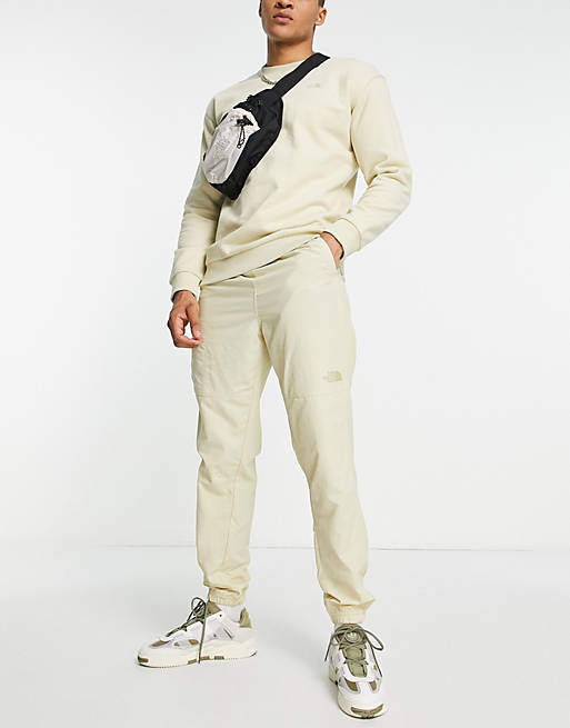 The North Face Woven joggers in beige | ASOS