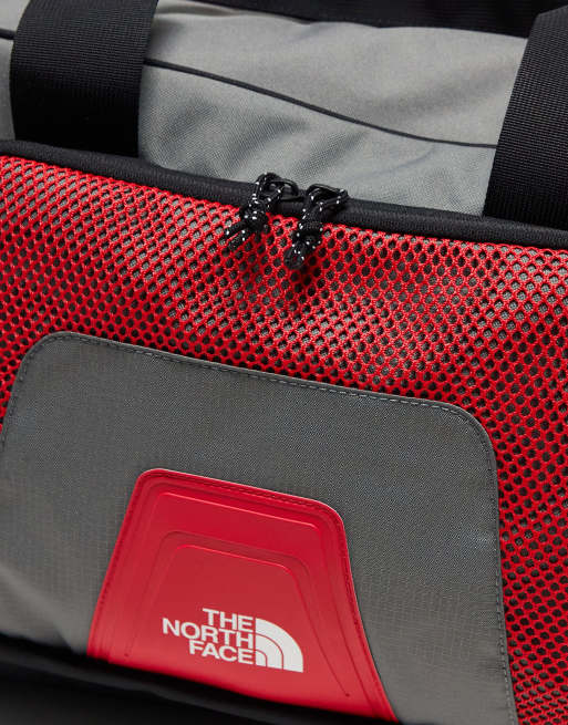 The North Face Y2K logo duffel bag in grey, 3 of 4