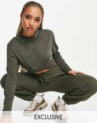 khaki green north face tracksuit