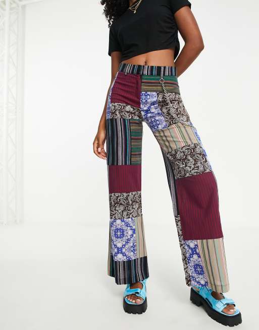 The Ragged Priest - Cargobroek met lage taille in patchwork print met ketting