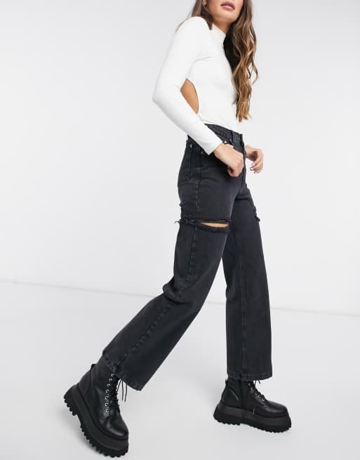 Black jeans store with distressed bottoms