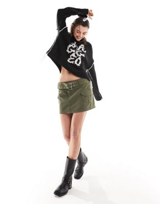 The Ragged Priest high neck logo jumper with side splits