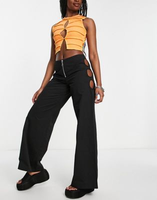 The Ragged Priest low waist Y2K trousers with zip front and hip cut outs