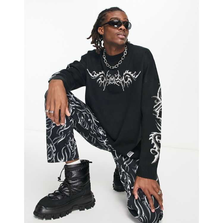 The Ragged Priest oversized knit jumper with grunge graphic in black | ASOS