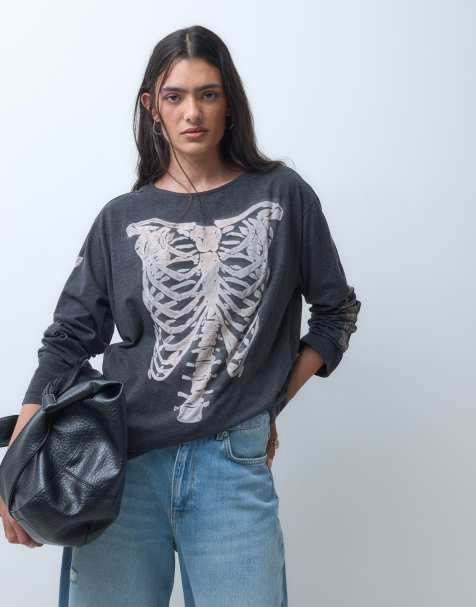 The Ragged Priest oversized long sleeve top with skeleton graphic in black