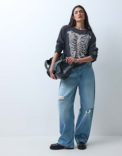 The Ragged Priest oversized long sleeve top with skeleton graphic in black, 3 of 5