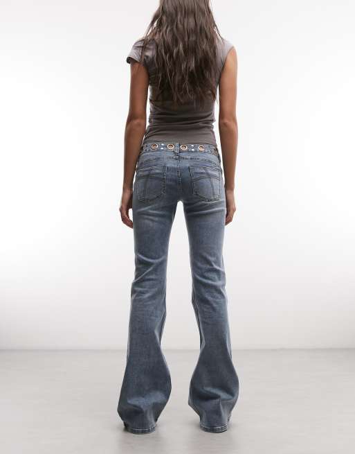 The Ragged Priest – Schlagjeans in Blau mit niedrigem Bund und Ösendetails, 2 von 5