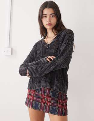 The Ragged Priest Slouchy Distressed V-neck Sweater In Black