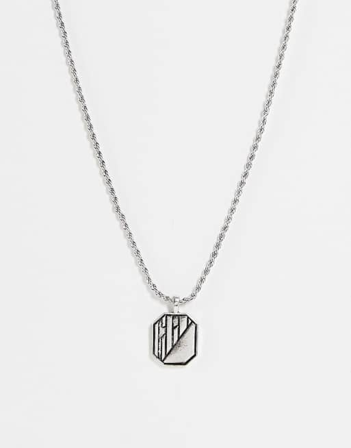 The Status Syndicate pendant necklace with texture detail in burnished silver finish