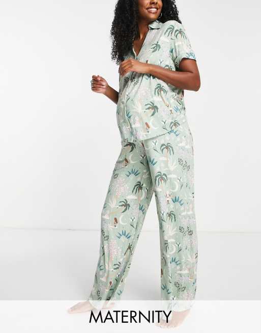 The Wellness Project x Chelsea Peers - Zwangerschapskleding - Pyjamaset met wijde pijpen in marineblauw met 'Bali Swing' print