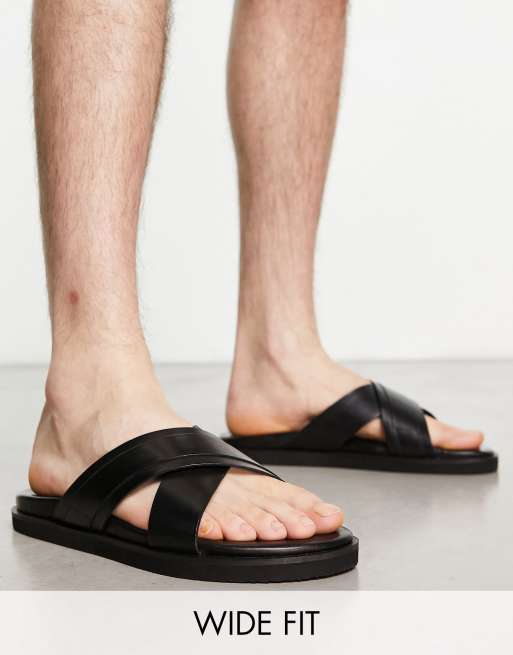 https://images.asos-media.com/products/thomas-crick-wide-fit-cross-strap-sandals-in-black-leather/204675580-1-black?$n_640w$&wid=513&fit=constrain