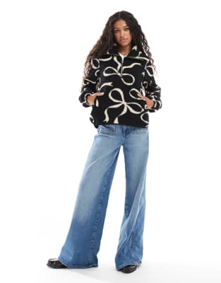 Threadbare 1/4 Zip Fleece With Bow Print In Black