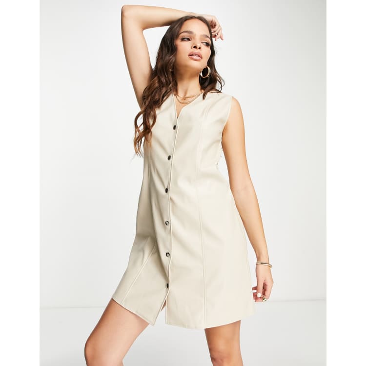 White sleeveless store button down dress