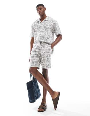 Threadbare Threadbare co-ord textured aztec print shorts in ecru-Navy