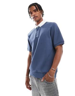 cotton blend short sleeve polo top with contrast collar in blue