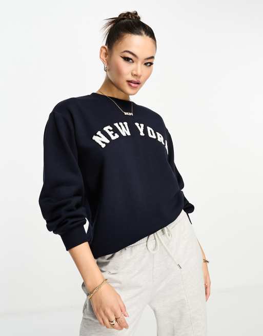 Threadbare Dixie oversized sweater with boucle slogan in navy | ASOS