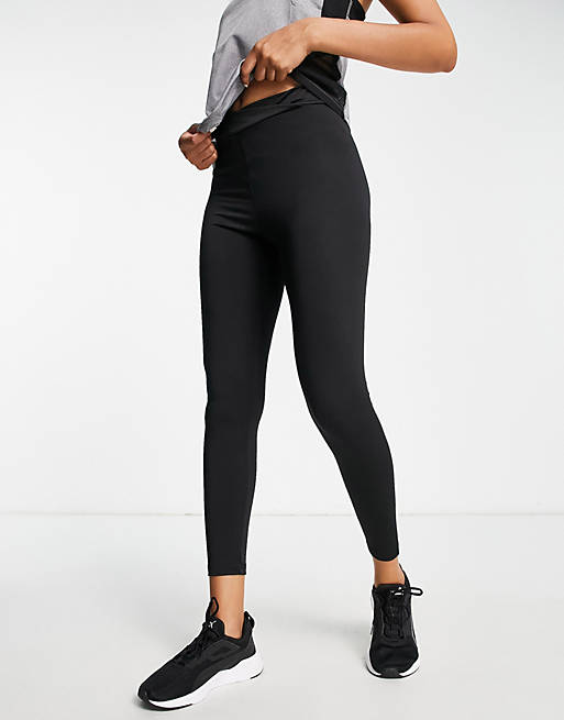 Threadbare Fitness crossed waistband gym leggings in black | ASOS