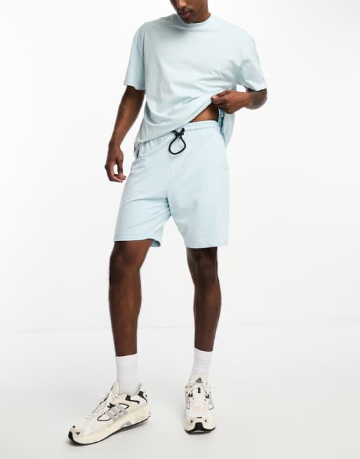 Threadbare Fitness oversized training shorts in light blue (part of a set)