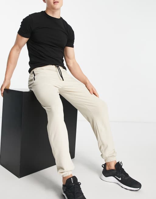 Slim fit joggers hot sale with zip pockets