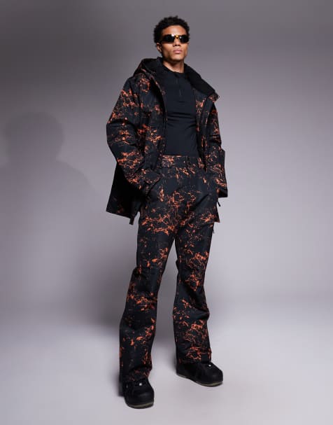 Threadbare – Gemusterte Skihose in Schwarz und Orange - view 1