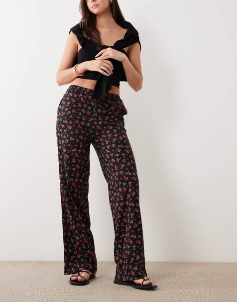 Threadbare jersey pull on trouser with drawstring in black with red floral print - view 1
