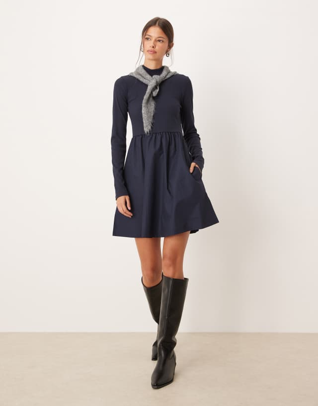black boots navy dress Threadbare long sleeve Hybrid Mini in Black Sleek Halter Mini styleattribute-basics The dress features a Size:us:6
