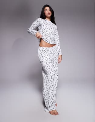 Threadbare Threadbare long sleeve lettuce hem ski print pyjamas in white and blue