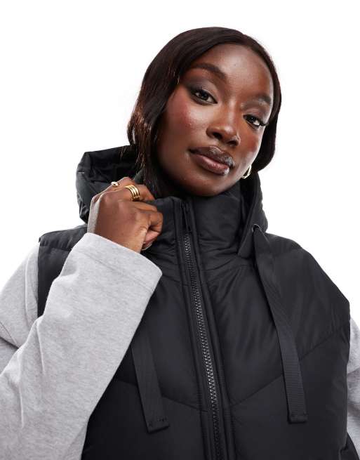 Threadbare Plus longline padded gilet with hood in black ASOS