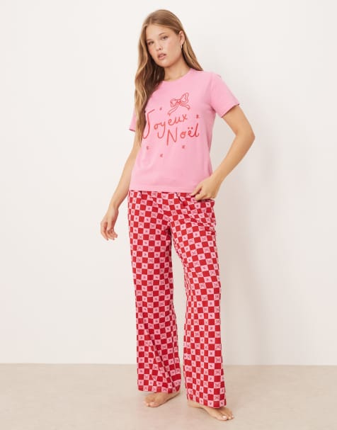 Threadbare – Rosa och röd pyjamas med mönstrade byxor och kortärmad t-shirt med 'Noel'-tryck - view 1