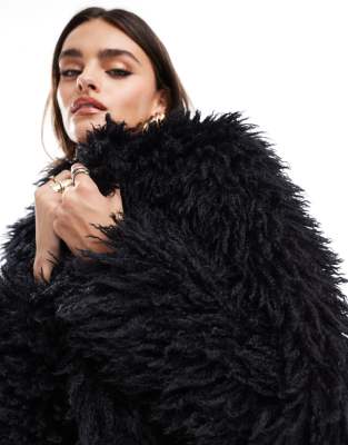 Threadbare shaggy faux fur jacket in black | ASOS