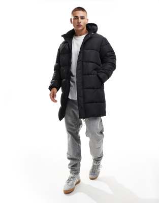 showerproof longline puffer with hood in black