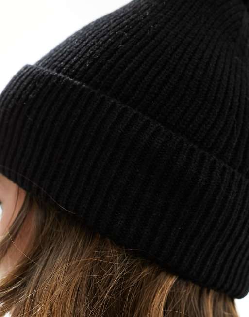 Threadbare Ski faux fur bobble hat in black | ASOS